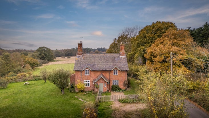 The exterior of Bridge Farm Cottage, a semi-detatched cottage, Suffolk